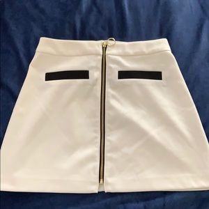 Mid length, high rise zipper skirt
